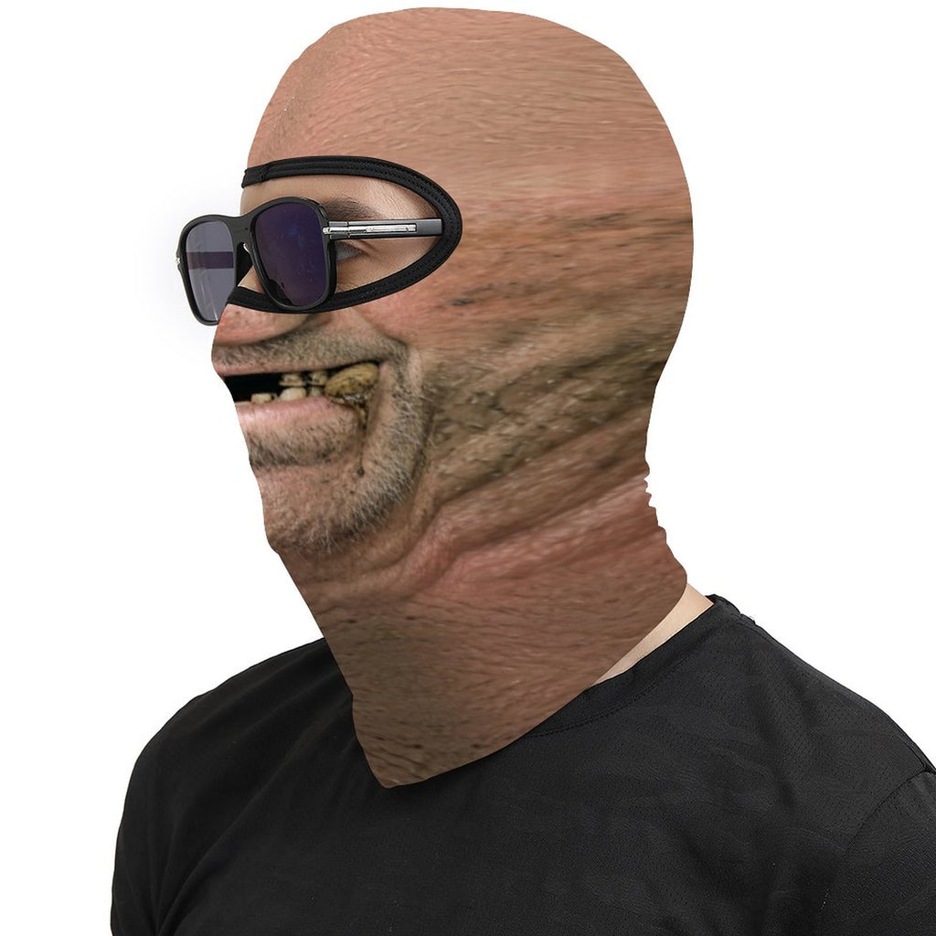 Toothless Tom funny face balaclava, printed gap-toothed grin, worn with sunglasses, side profile