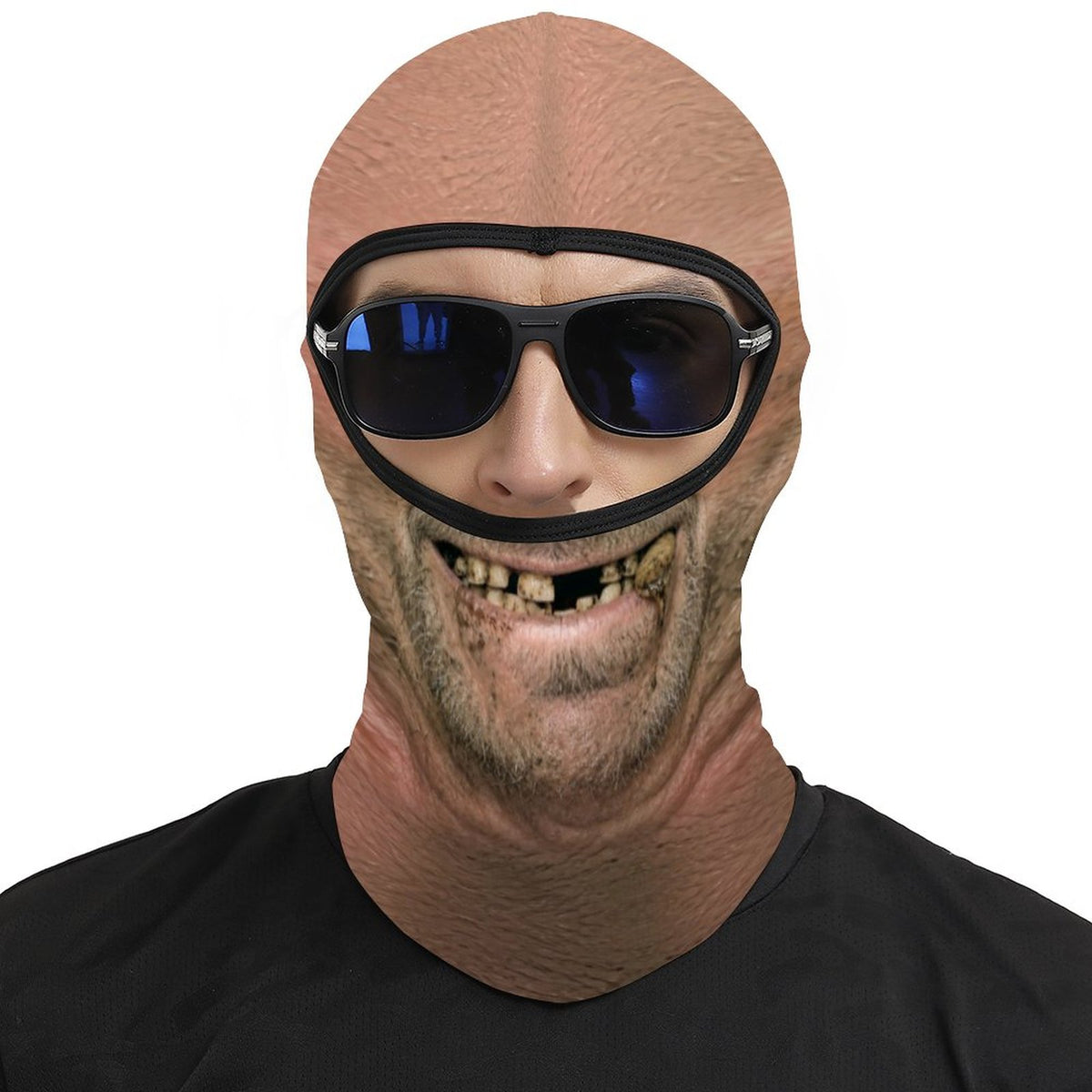 Toothless Tom funny face balaclava, printed gap-toothed grin, worn with blue sunglasses over the open eye band, front view