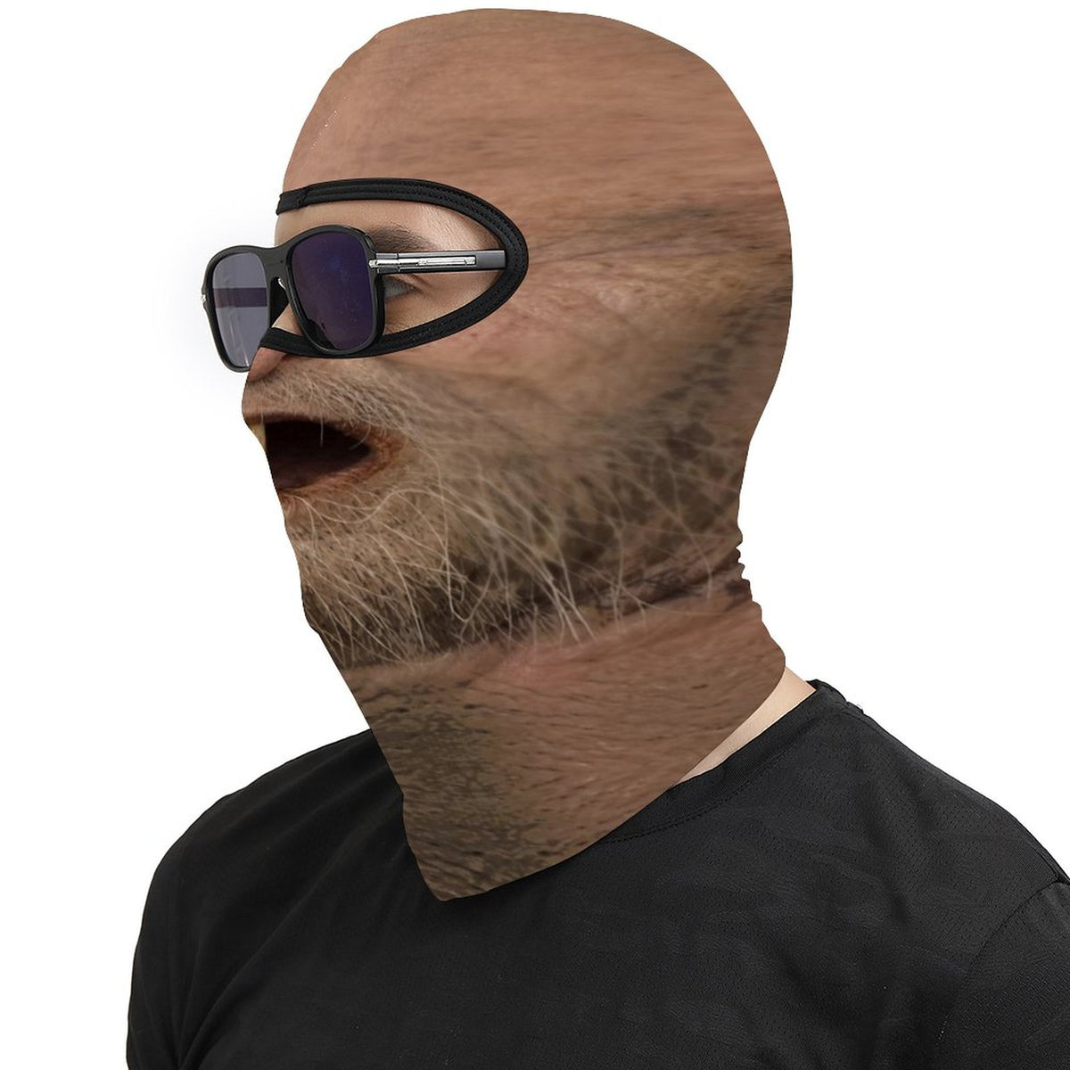 One Tooth Willie funny face balaclava, printed dropped jaw, one tooth and scruffy beard, worn with sunglasses, side profile